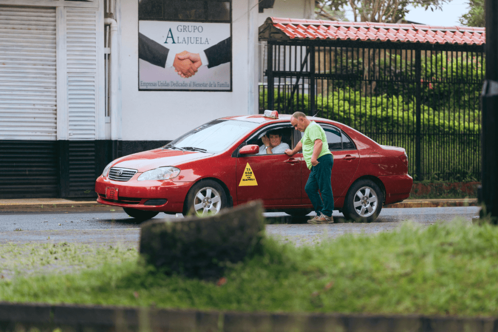 The red taxis with yellow triangles are the official taxes in Costa Rica.