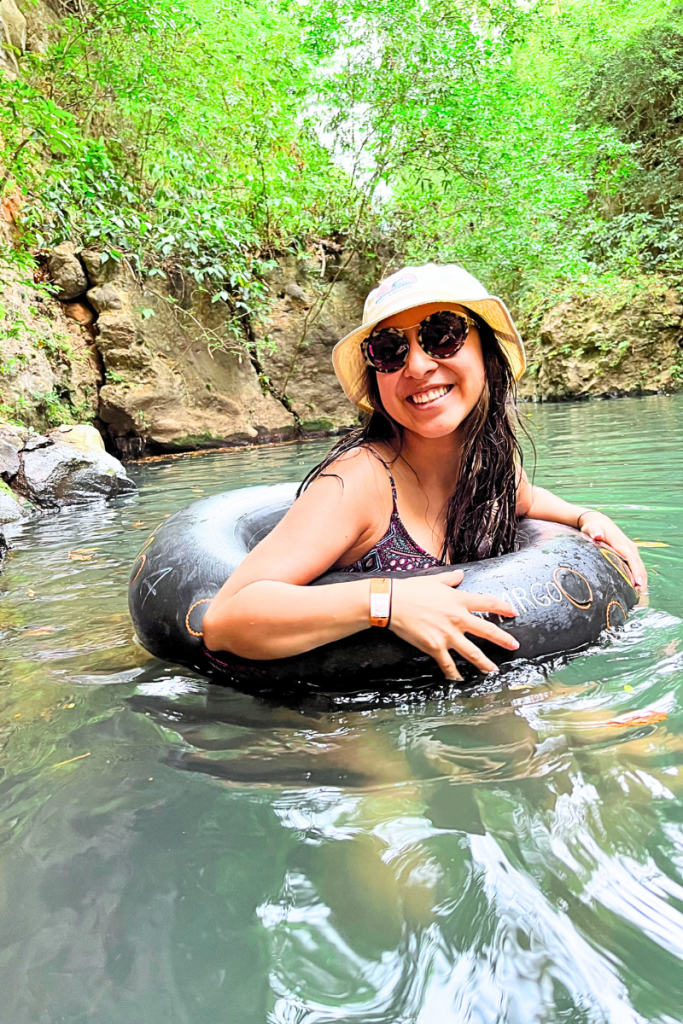 A woman enjoying Poza Los Coyotes in Guanacaste, Costa Rica. One of the natural wonders of the area.